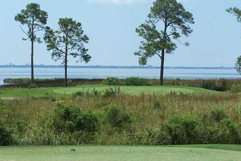 Enjoy a free round of golf at this well maintained golf course at Bluewater Bay in Niceville, Florida when staying at an Xplorie participating property.