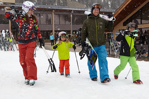 Person skiing with a rental from Christy Sports in Winter Park, Colorado, which is available for free at Xplorie participating properties.