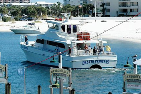 The Destin Princess boat takes off from the harbor in Destin, Florida for another exciting fishing adventure, which is available for free at Xplorie participating properties.