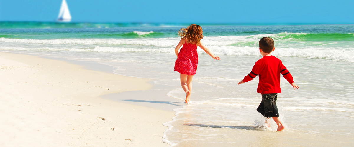 Kids running and having fun on the beach on Florida's Forgotten Coast